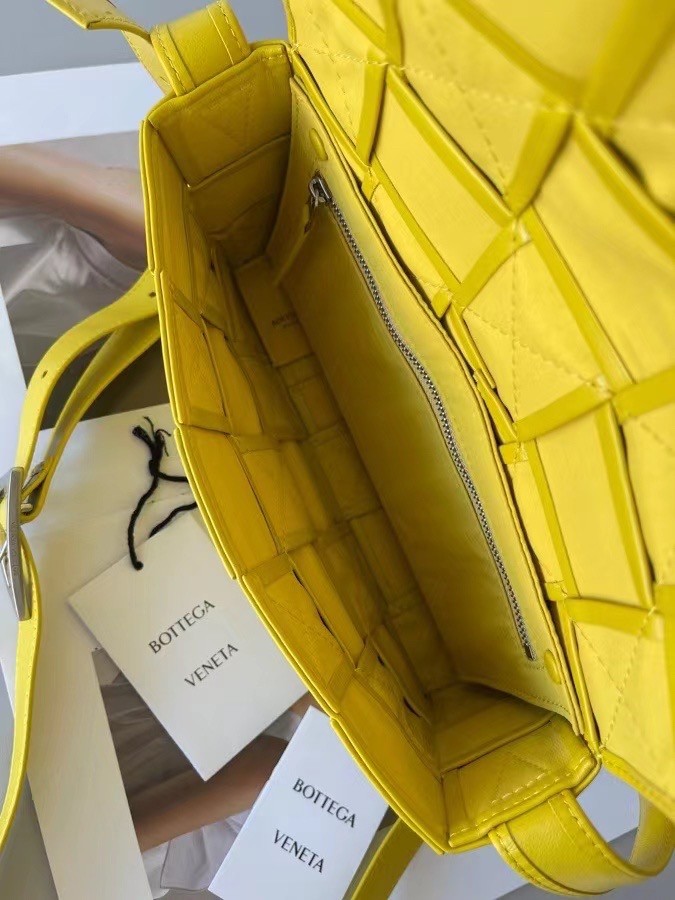 bo*te*ga Ve*ne*ta cassett bag in yellow wrinkled calfskin