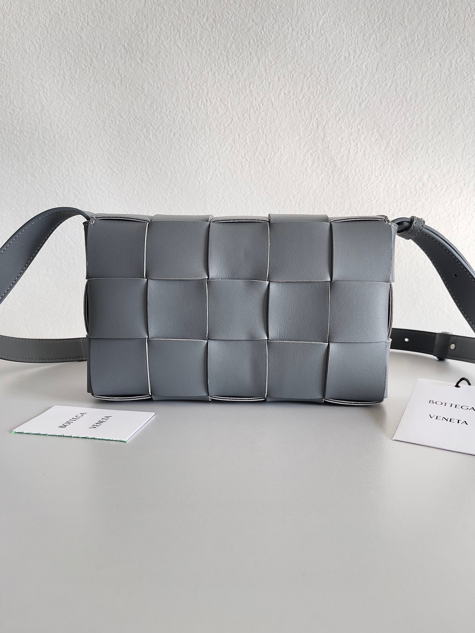 bo*te*ga Ve*ne*ta cassett bag in thunder intrecciato lambskin