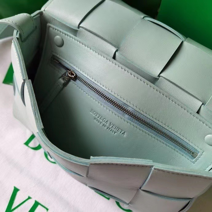 bo*te*ga Ve*ne*ta cassett bag in teal washed intrecciato lambskin