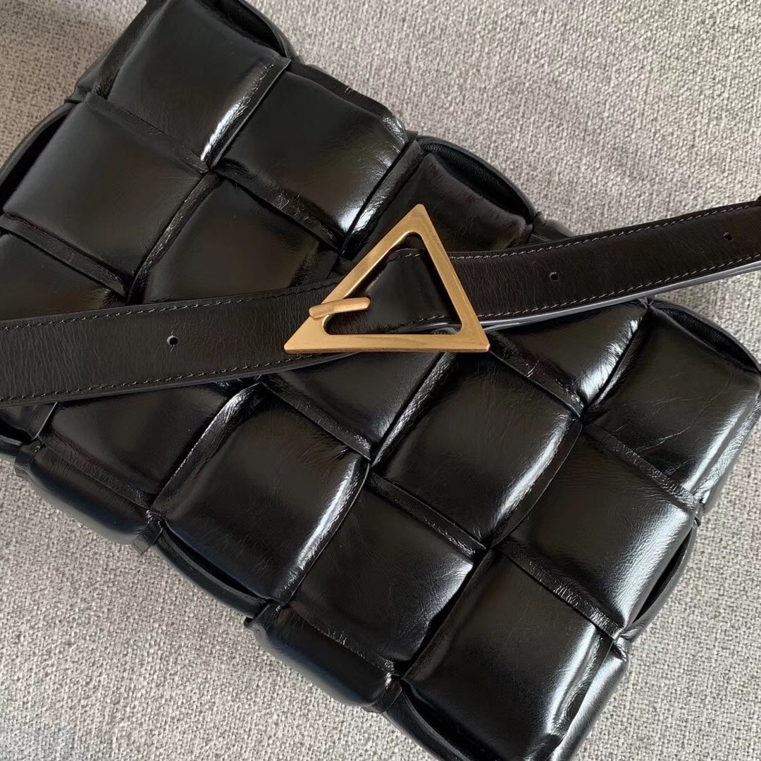 bo*te*ga Ve*ne*ta padded cassette bag in black calfskin