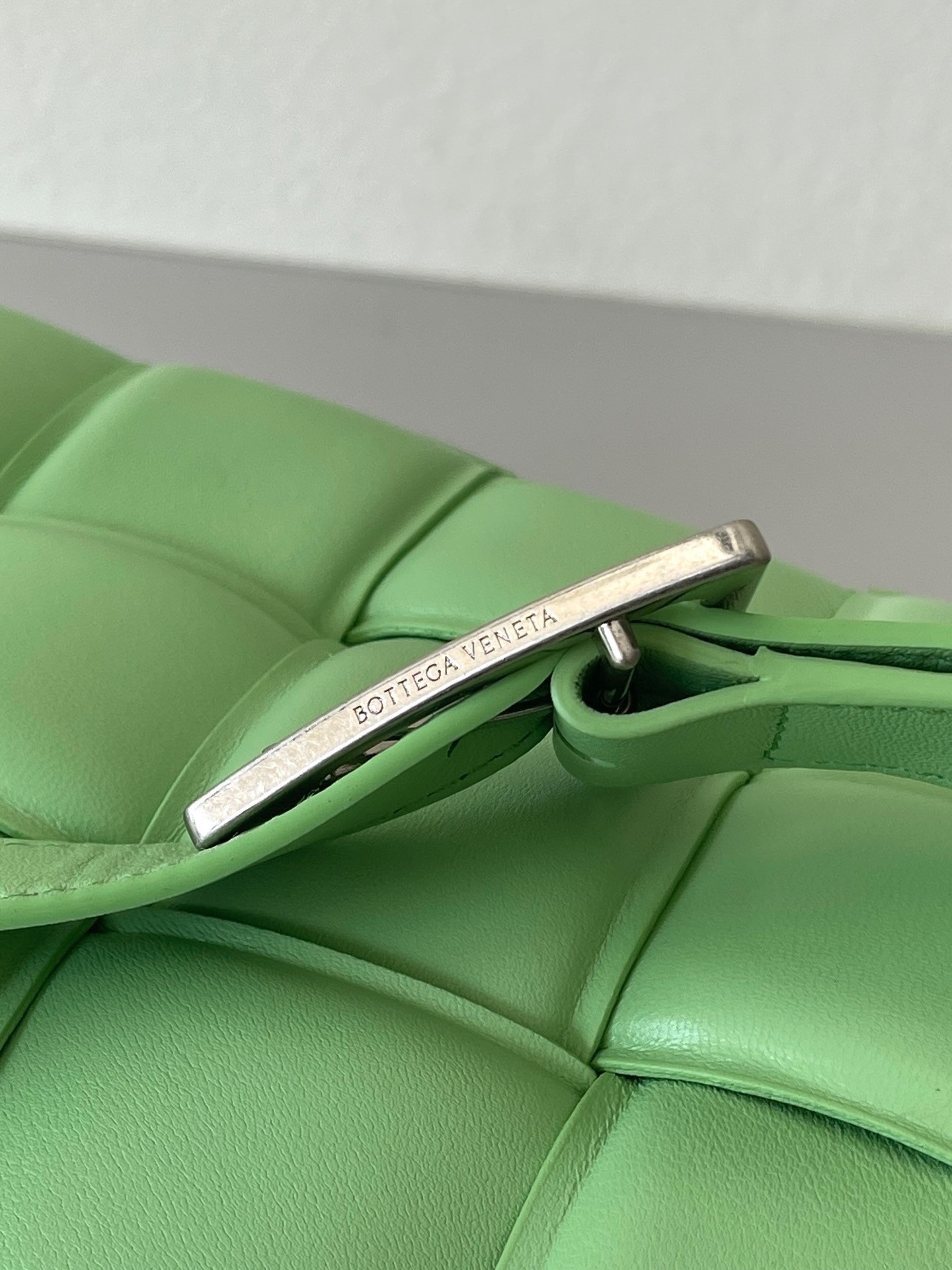 bo*te*ga Ve*ne*ta padded cassette bag in acid green lambskin