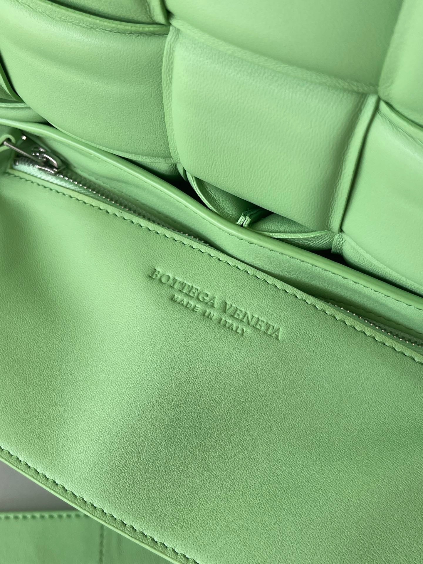 bo*te*ga Ve*ne*ta padded cassette bag in acid green lambskin