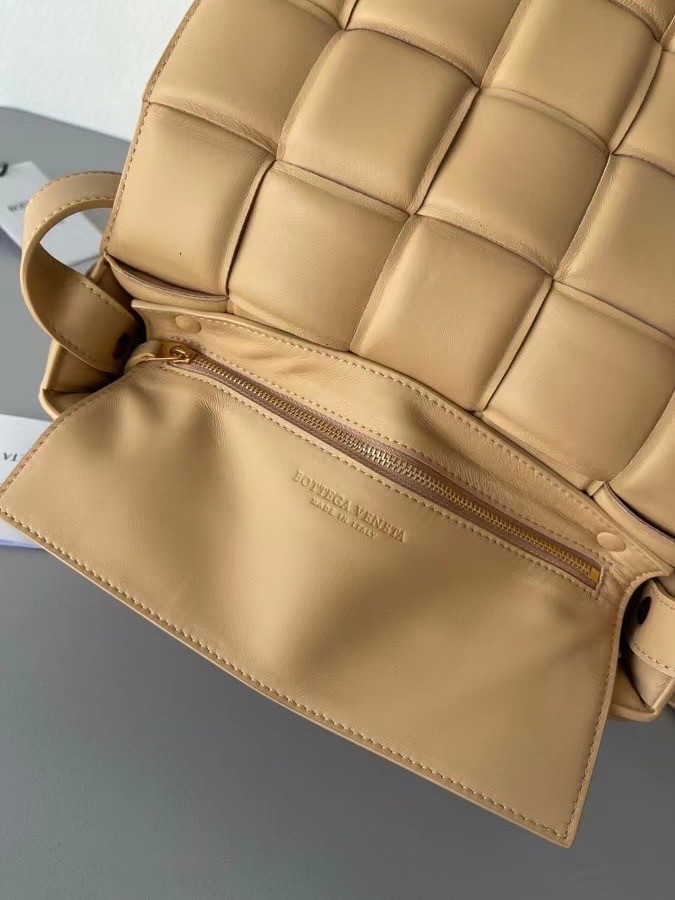 bo*te*ga Ve*ne*ta padded cassette bag in almond lambskin