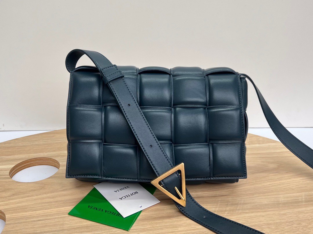 bo*te*ga Ve*ne*ta padded cassette bag in dark blue intrecciato lambskin