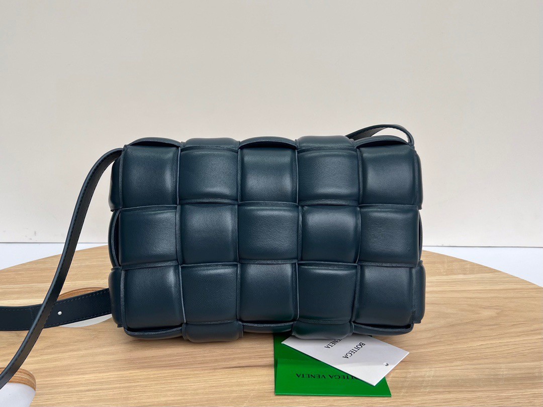bo*te*ga Ve*ne*ta padded cassette bag in dark blue intrecciato lambskin