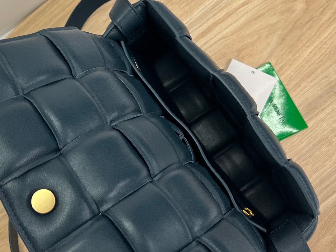 bo*te*ga Ve*ne*ta padded cassette bag in dark blue intrecciato lambskin
