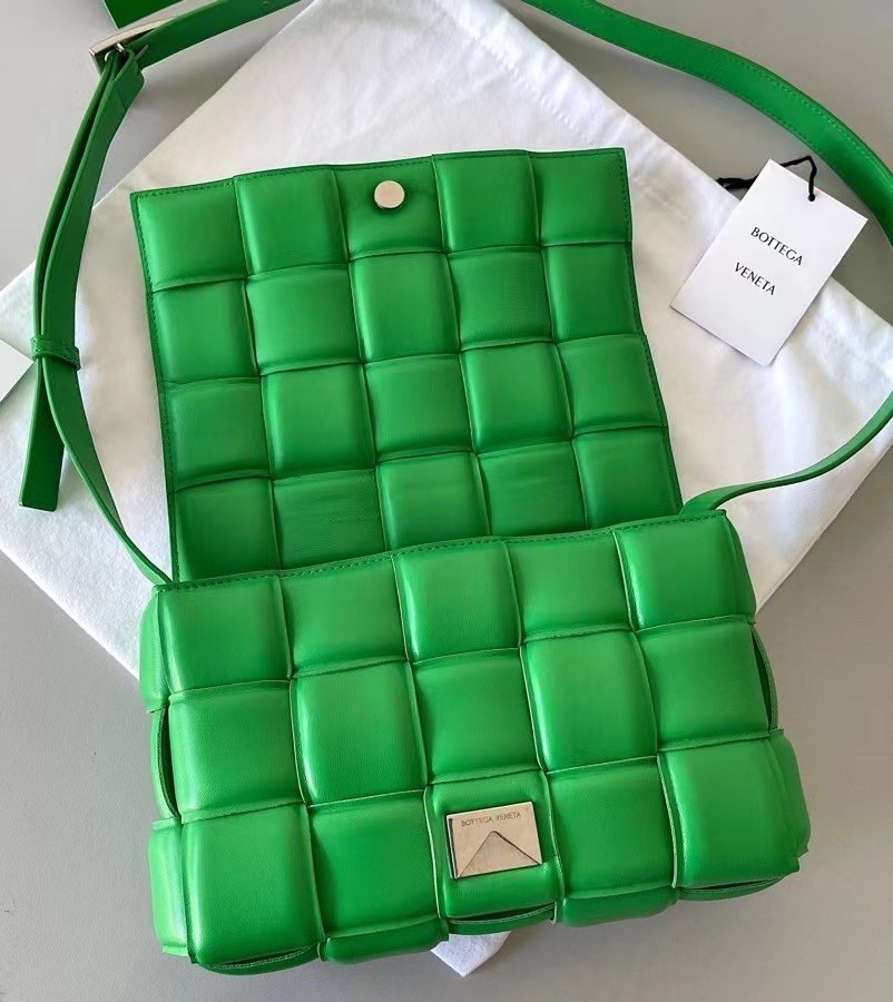 bo*te*ga Ve*ne*ta padded cassette bag in green lambskin