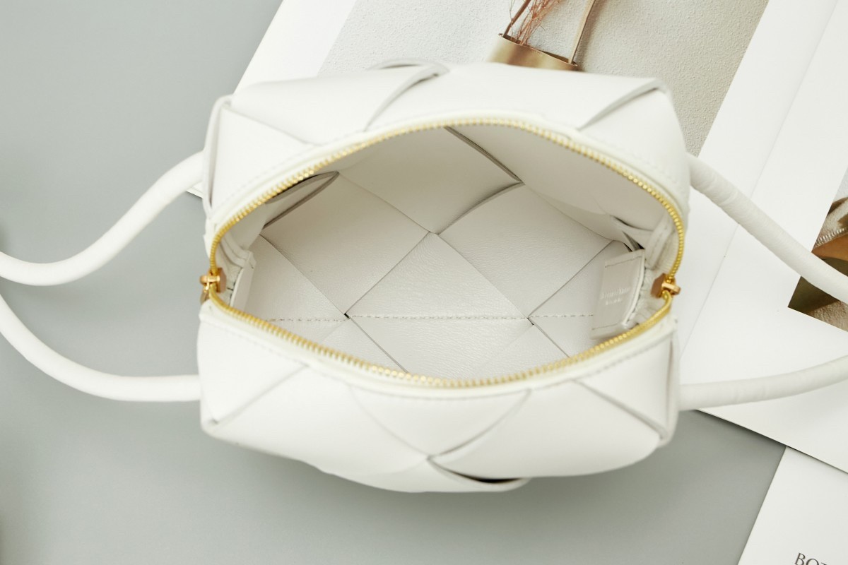 bo*te*ga Ve*ne*ta mini cassette camera bag in white lambskin