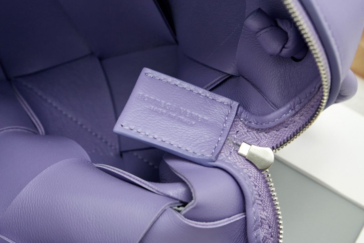 bo*te*ga Ve*ne*ta small cassette camera bag in wisteria lambskin