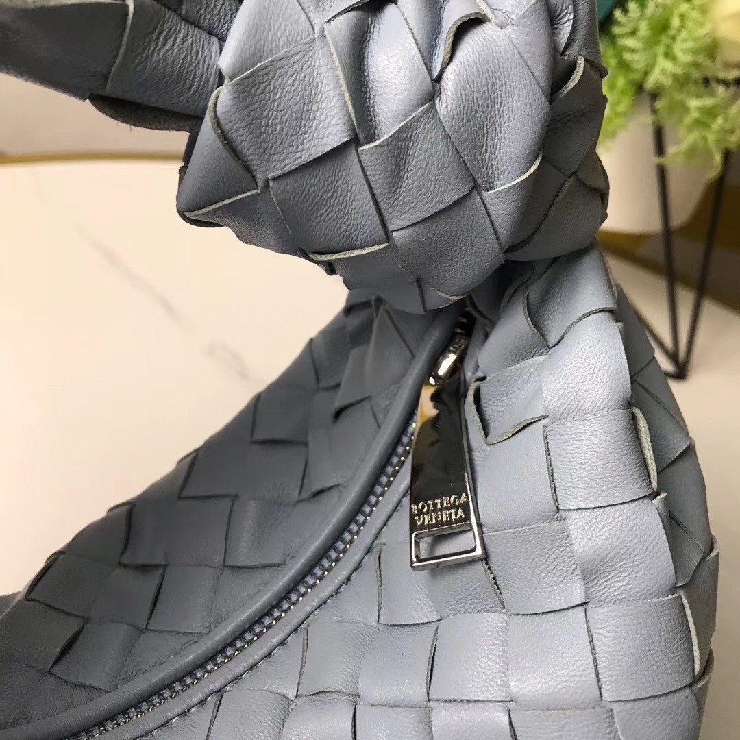 bo*te*ga Ve*ne*ta mini bv jodie bag in light blue woven leather