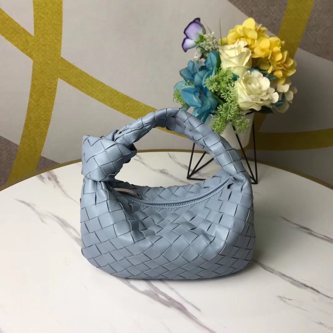 bo*te*ga Ve*ne*ta mini bv jodie bag in light blue woven leather
