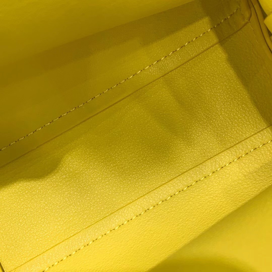 bo*te*ga Ve*ne*ta small point top handle bag in yellow leather