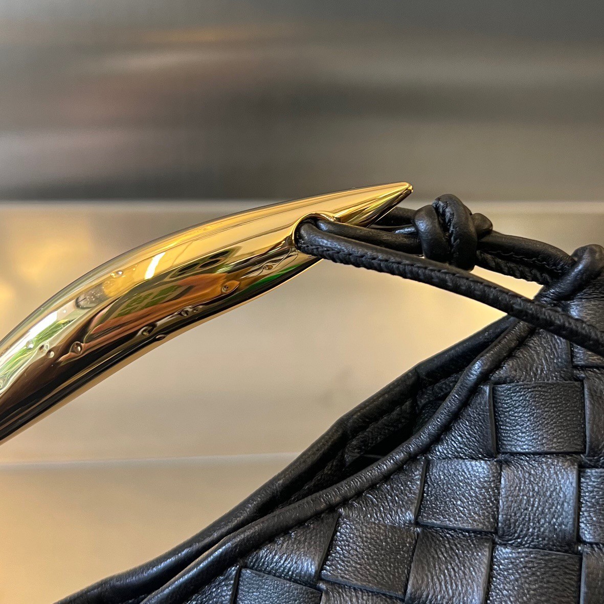bo*te*ga Ve*ne*ta sardine mini bag in black intrecciato lambskin