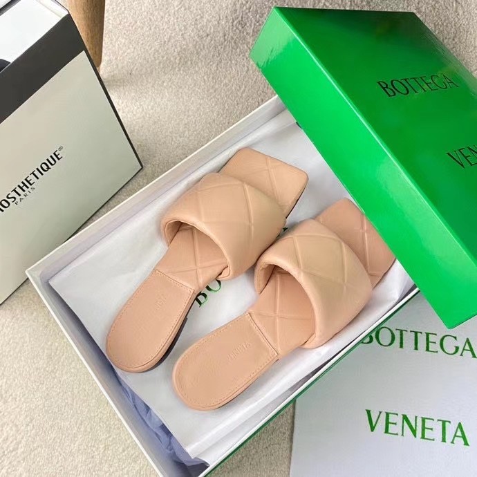 bo*te*ga Ve*ne*ta rubber lido slides in peachy lambskin