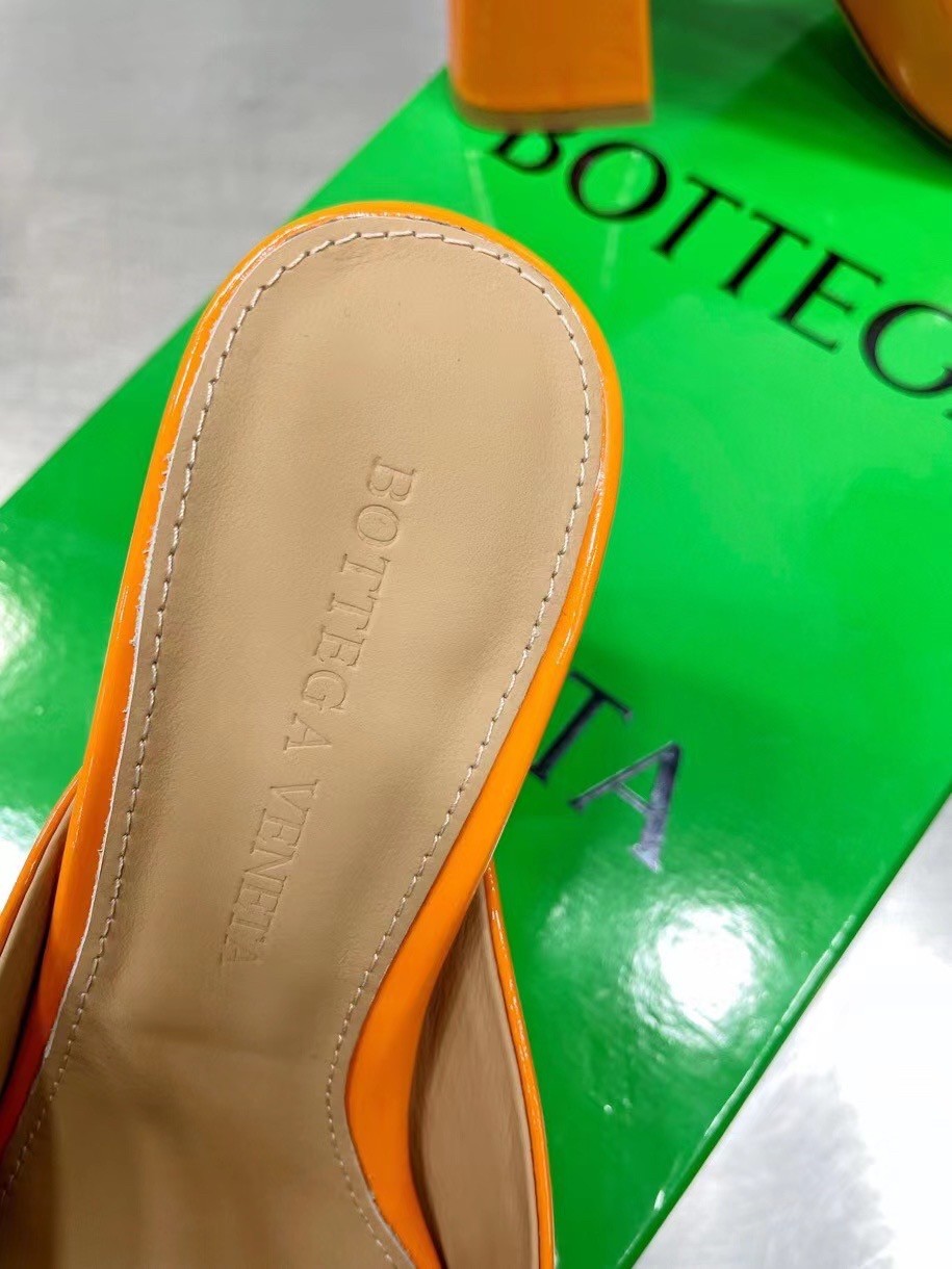 bo*te*ga Ve*ne*ta tower mules in orange patent calfskin