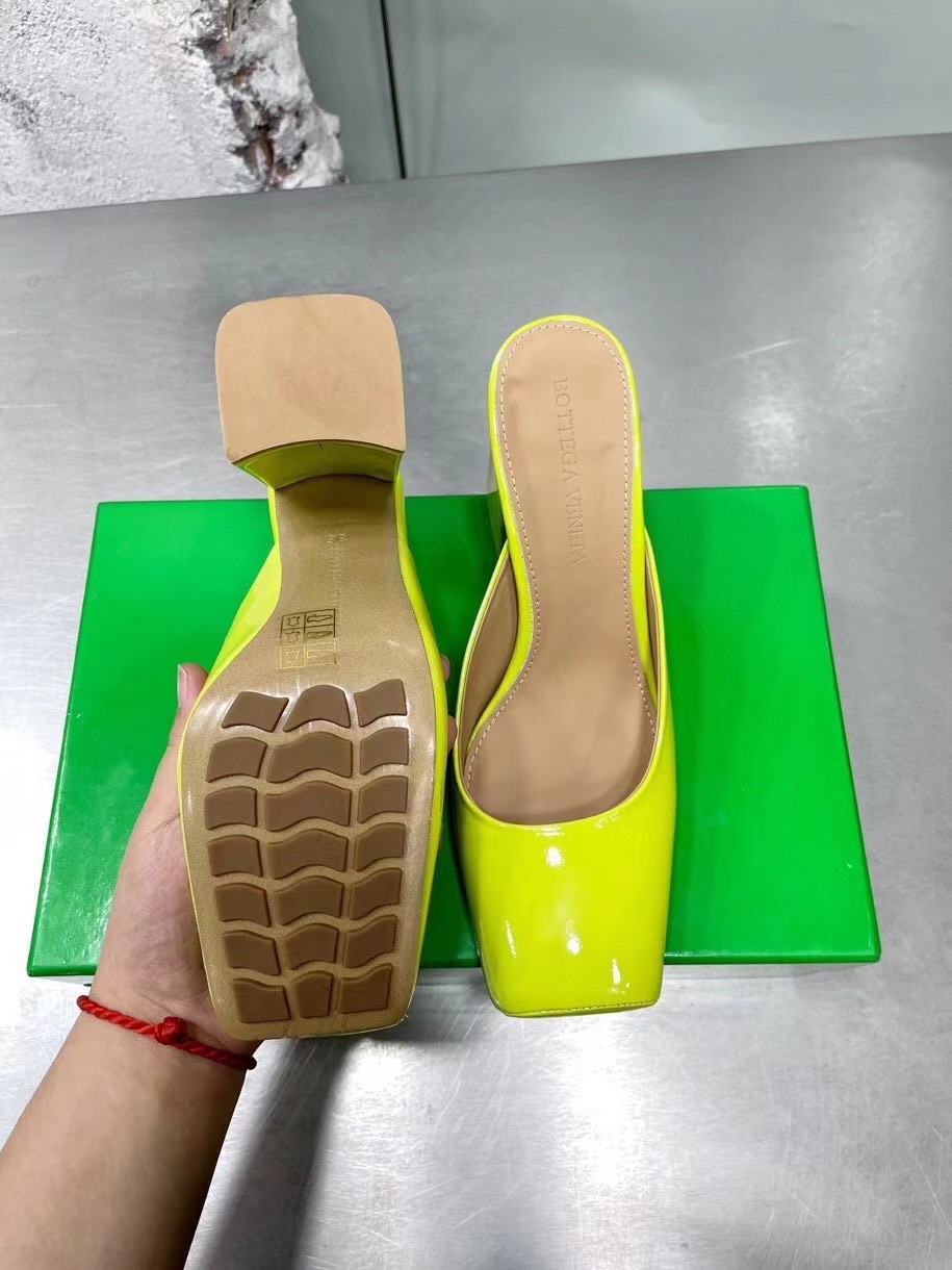 bo*te*ga Ve*ne*ta tower mules in yellow patent calfskin