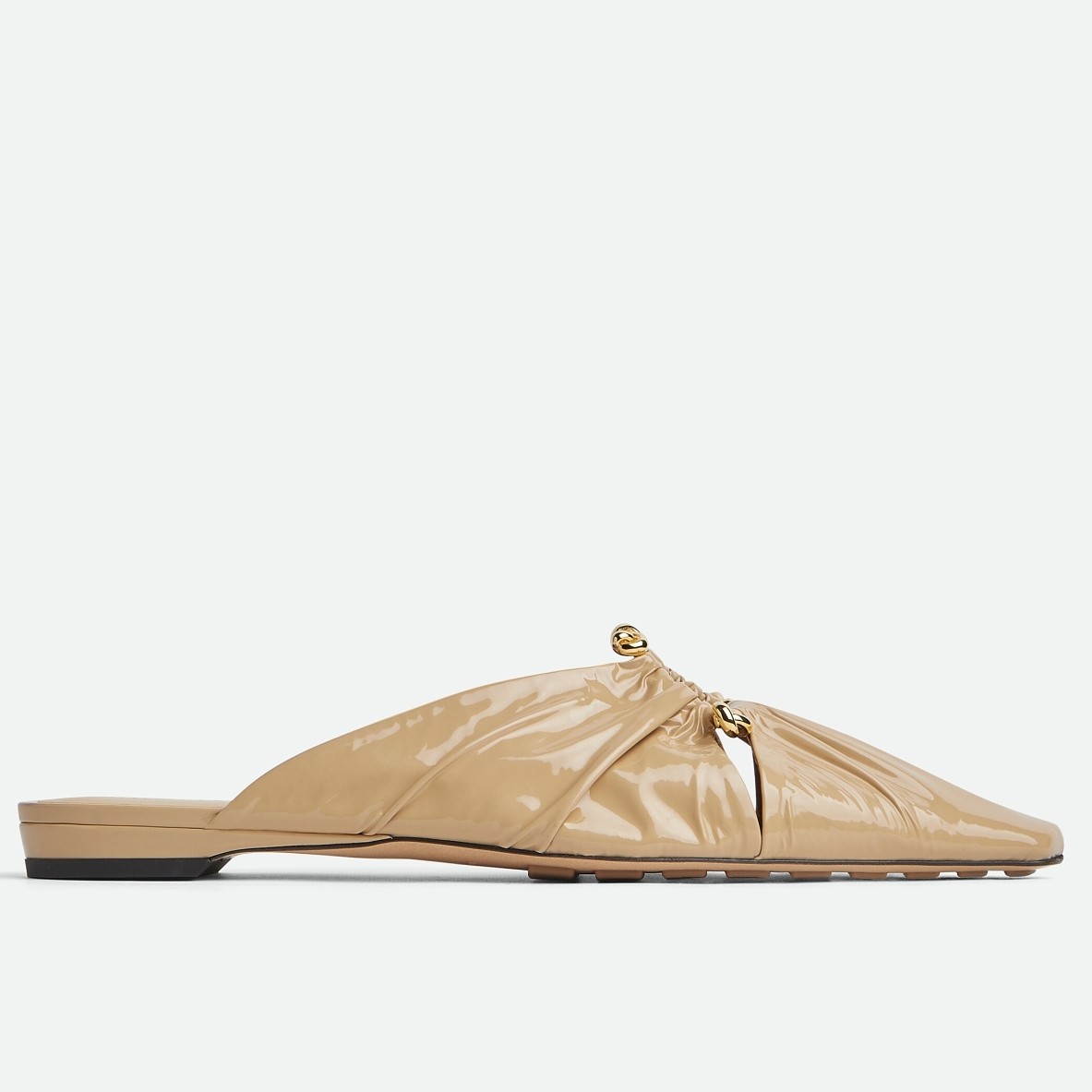bo*te*ga Ve*ne*ta bunnie flat mules in beige patent leather