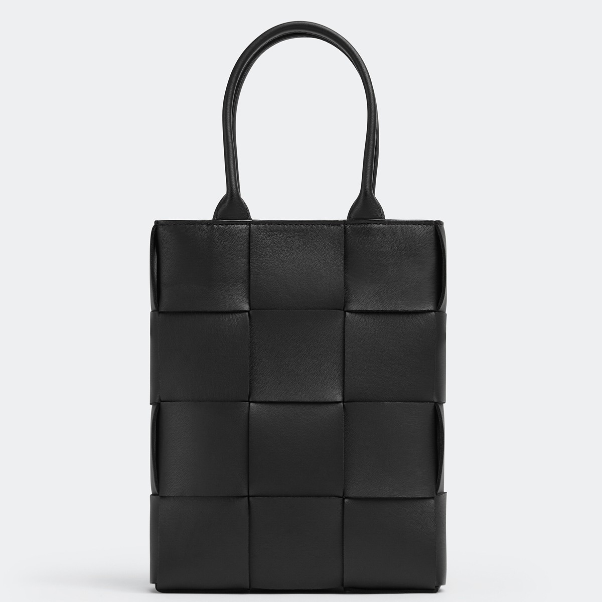 bo*te*ga Ve*ne*ta mini cassette tote bag in black lambskin