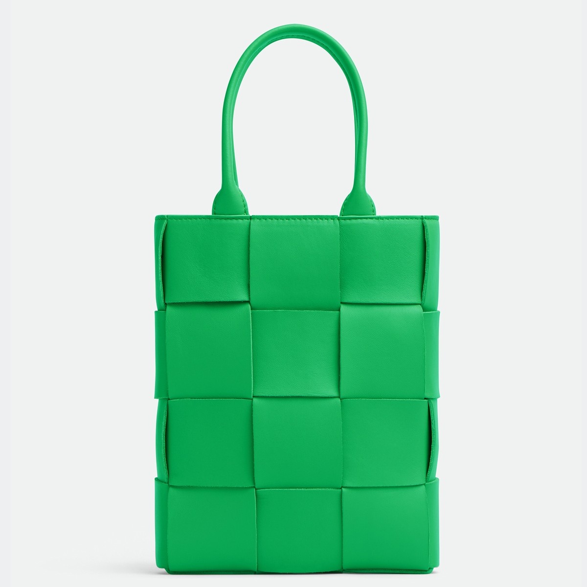bo*te*ga Ve*ne*ta mini cassette tote bag in parakeet lambskin