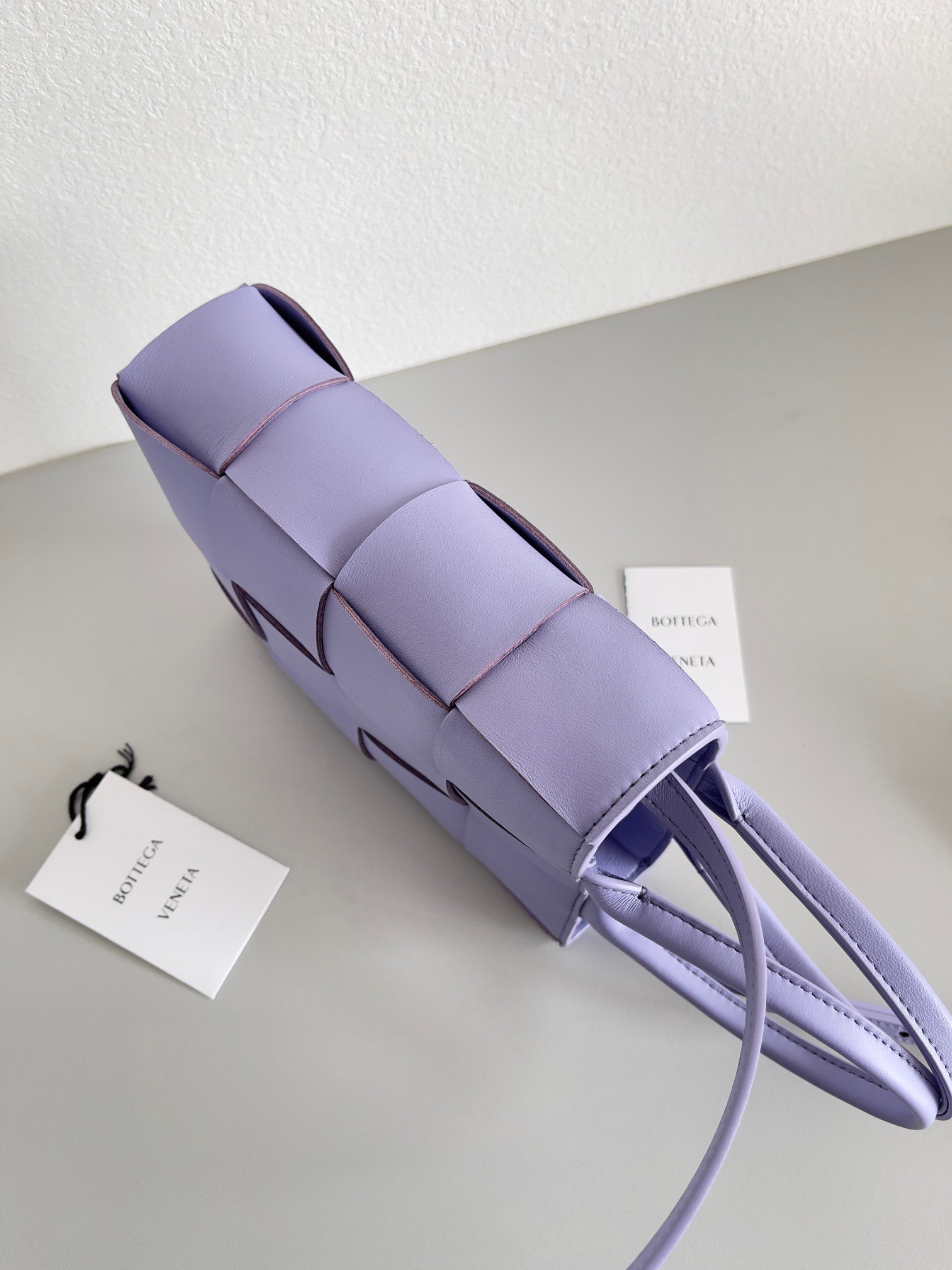 bo*te*ga Ve*ne*ta mini cassette tote bag in wisteria lambskin