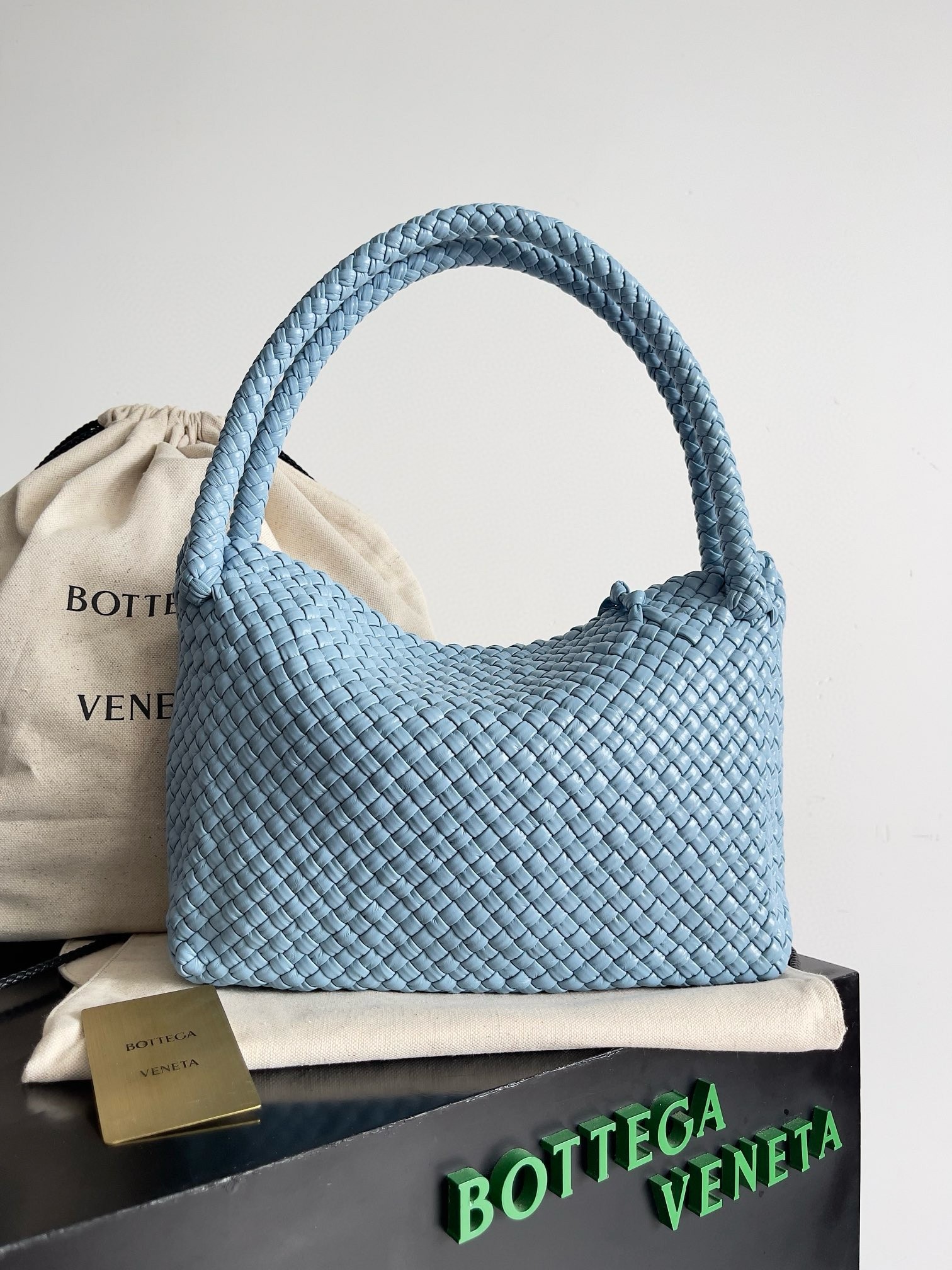 bo*te*ga Ve*ne*ta tosca bag in light blue intrecciato calfskin