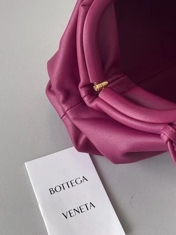 bo*te*ga Ve*ne*ta mini pouch in cinnabar calfskin