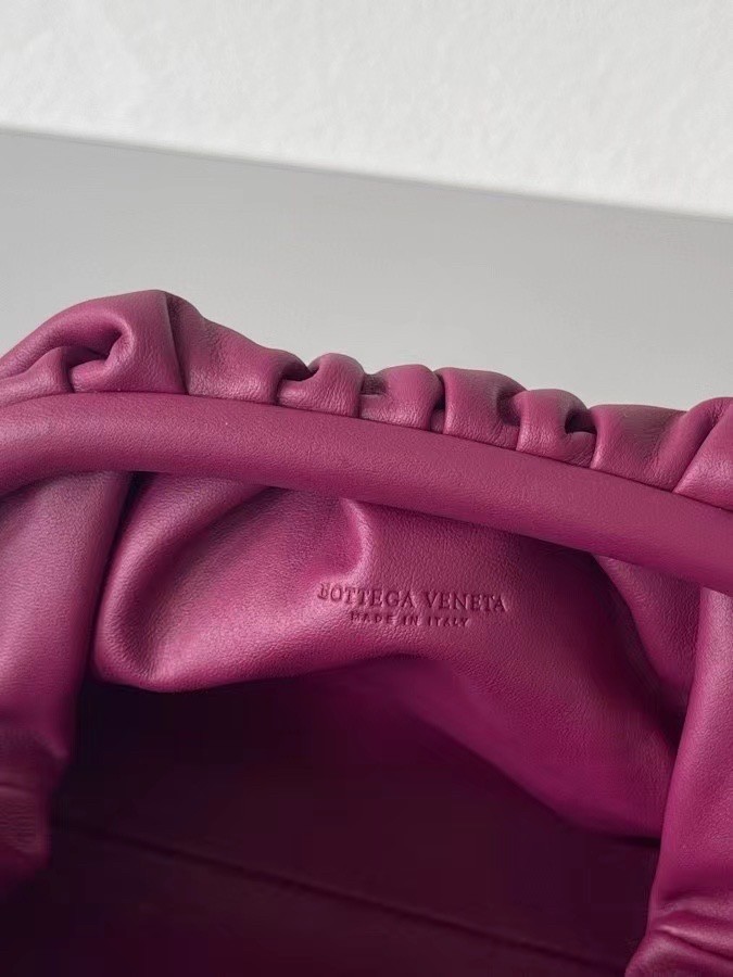 bo*te*ga Ve*ne*ta mini pouch in cinnabar calfskin