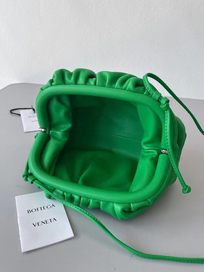 bo*te*ga Ve*ne*ta mini pouch in green calfskin