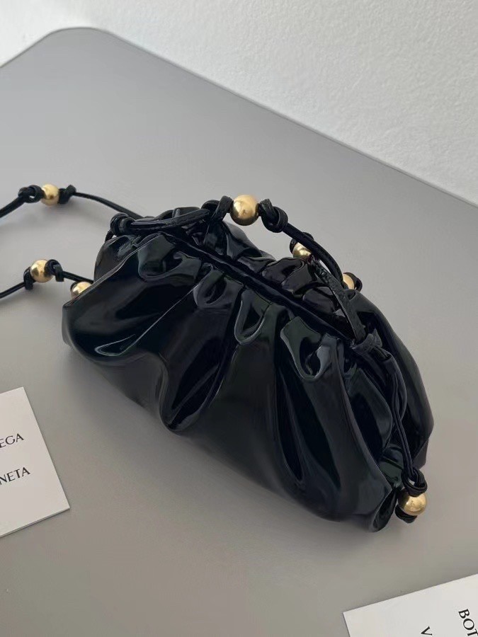 bo*te*ga Ve*ne*ta mini pouch in black patent leather