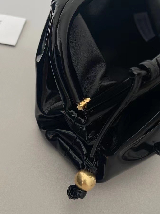 bo*te*ga Ve*ne*ta mini pouch in black patent leather