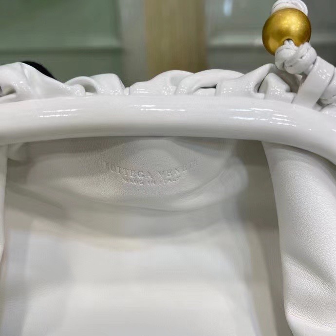 bo*te*ga Ve*ne*ta mini pouch in white patent leather
