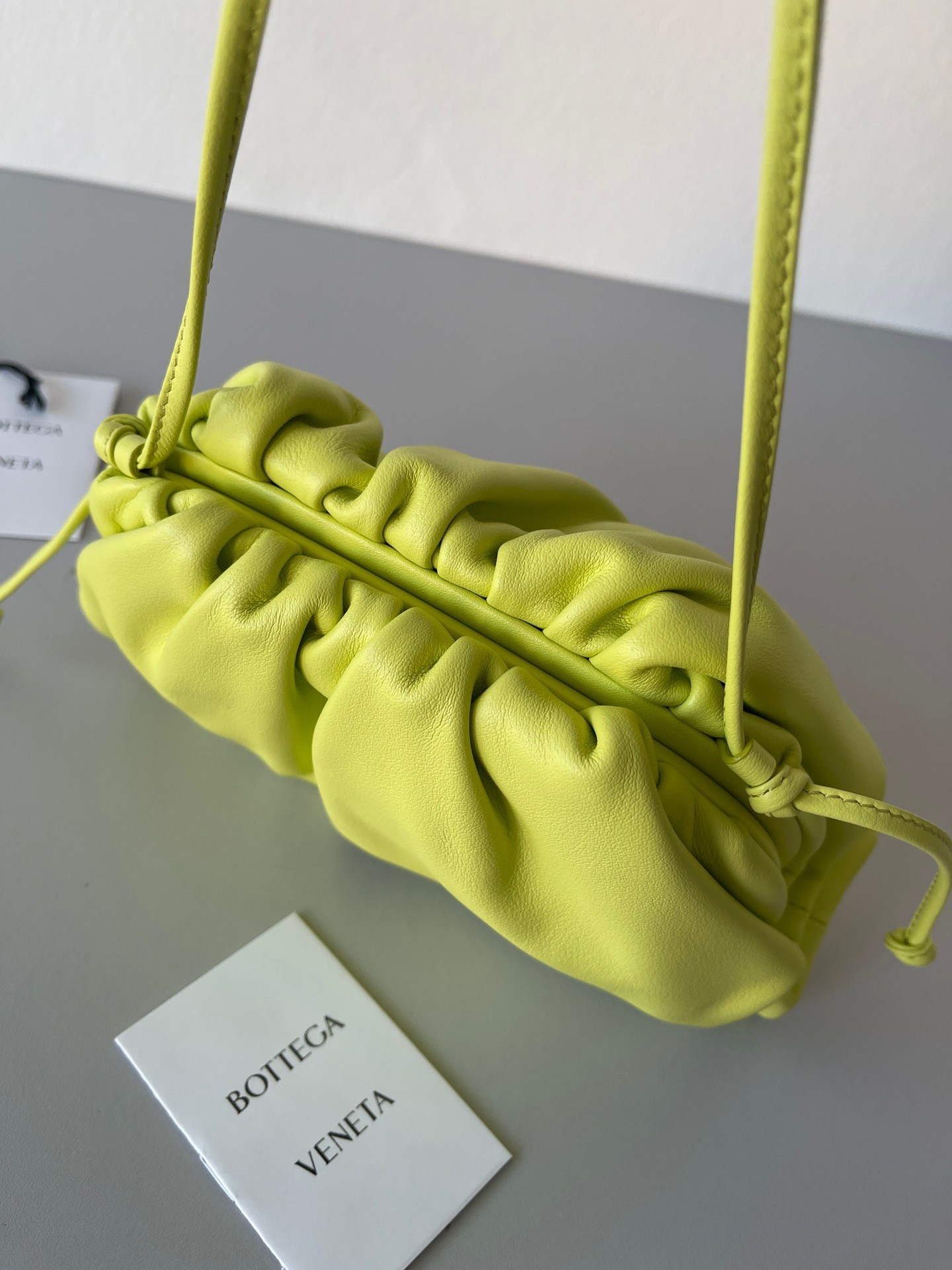 bo*te*ga Ve*ne*ta mini pouch bag in kiwi calfskin