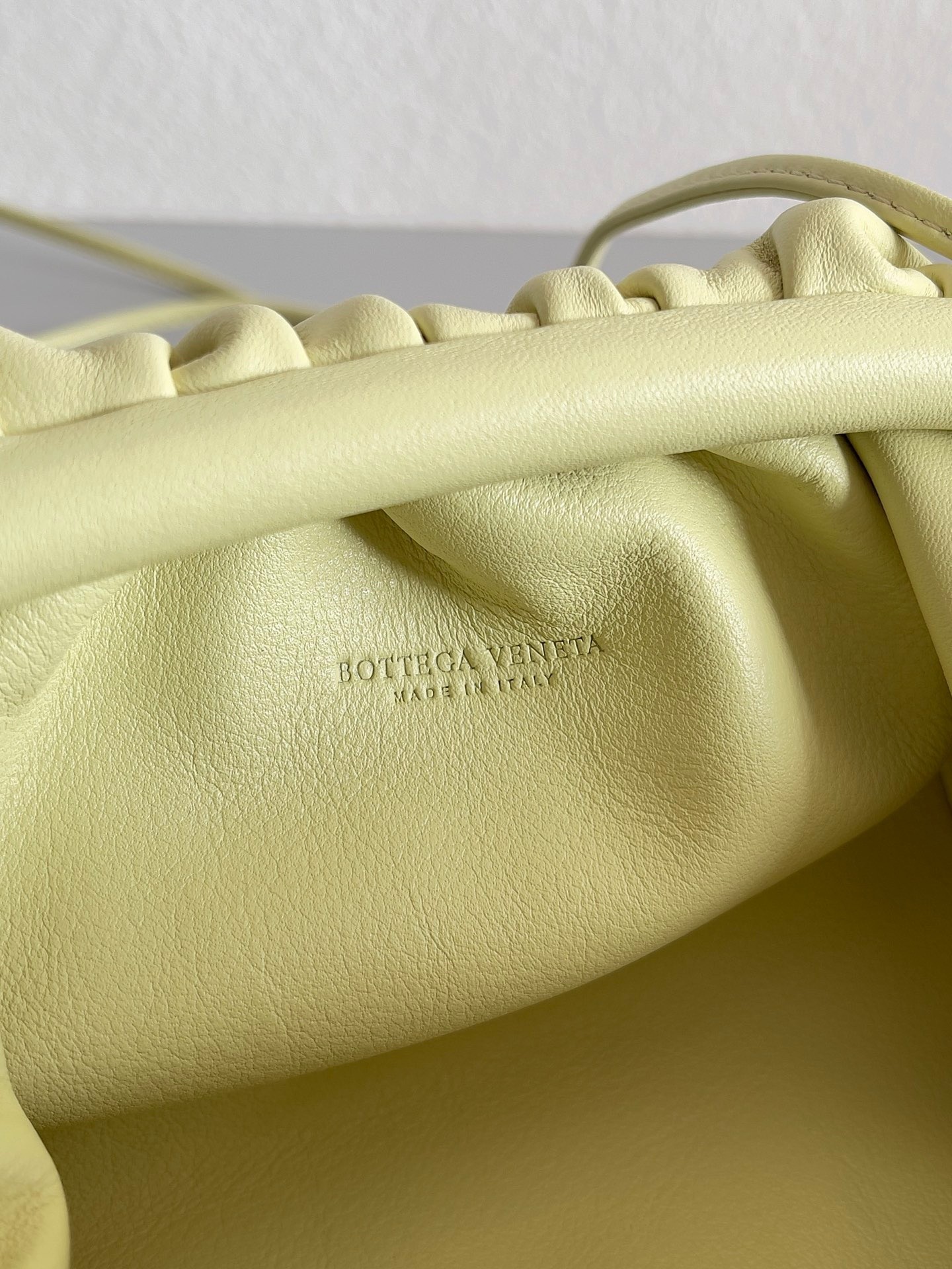 bo*te*ga Ve*ne*ta mini pouch bag in zest washed calfskin