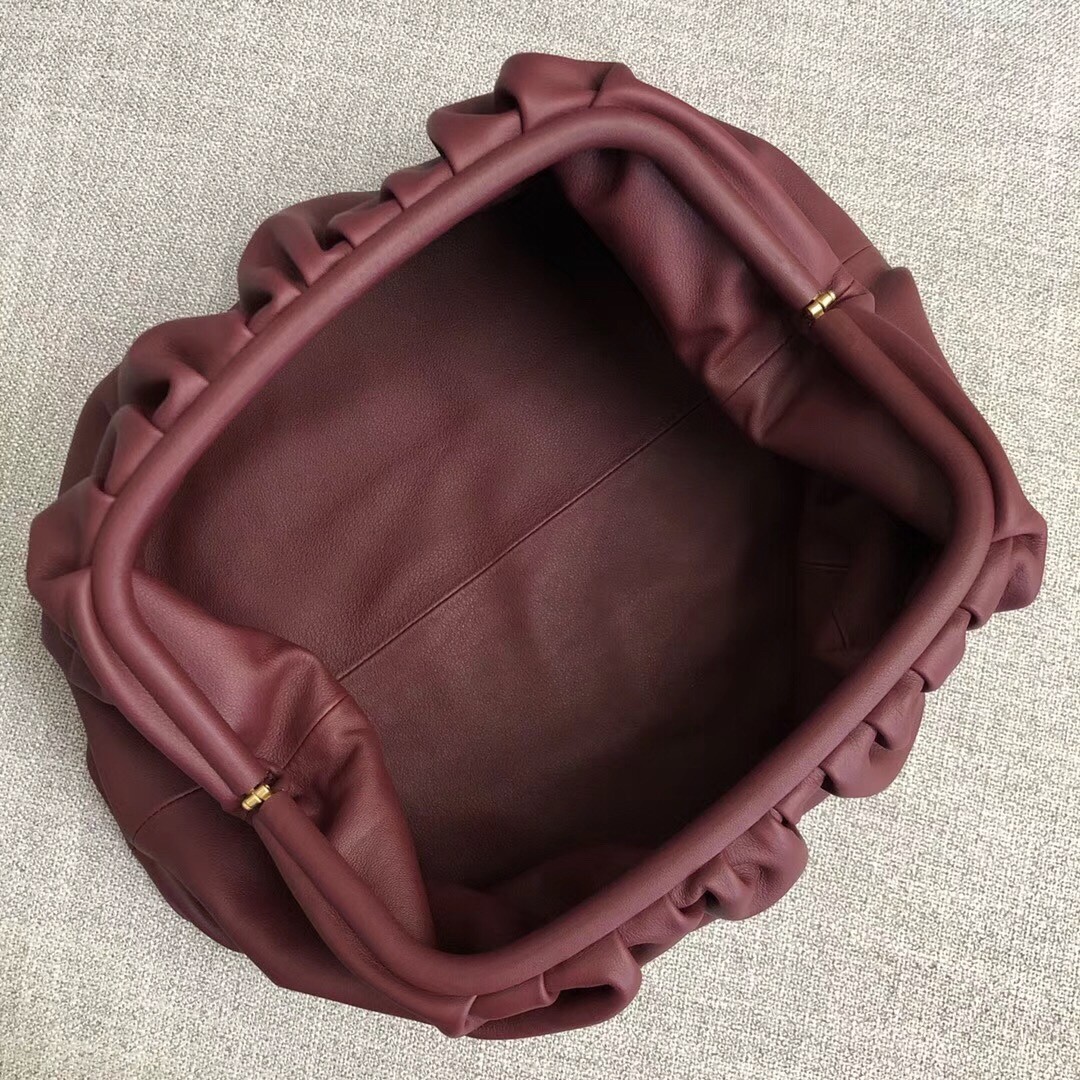 bo*te*ga Ve*ne*ta the pouch clutch in bordeaux calfskin