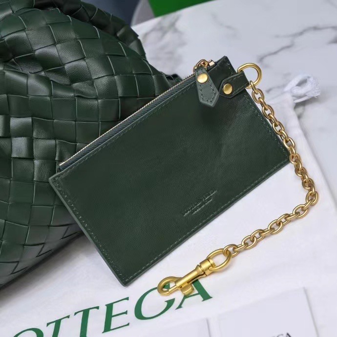 bo*te*ga Ve*ne*ta large pouch clutch in raintree intrecciato lambskin
