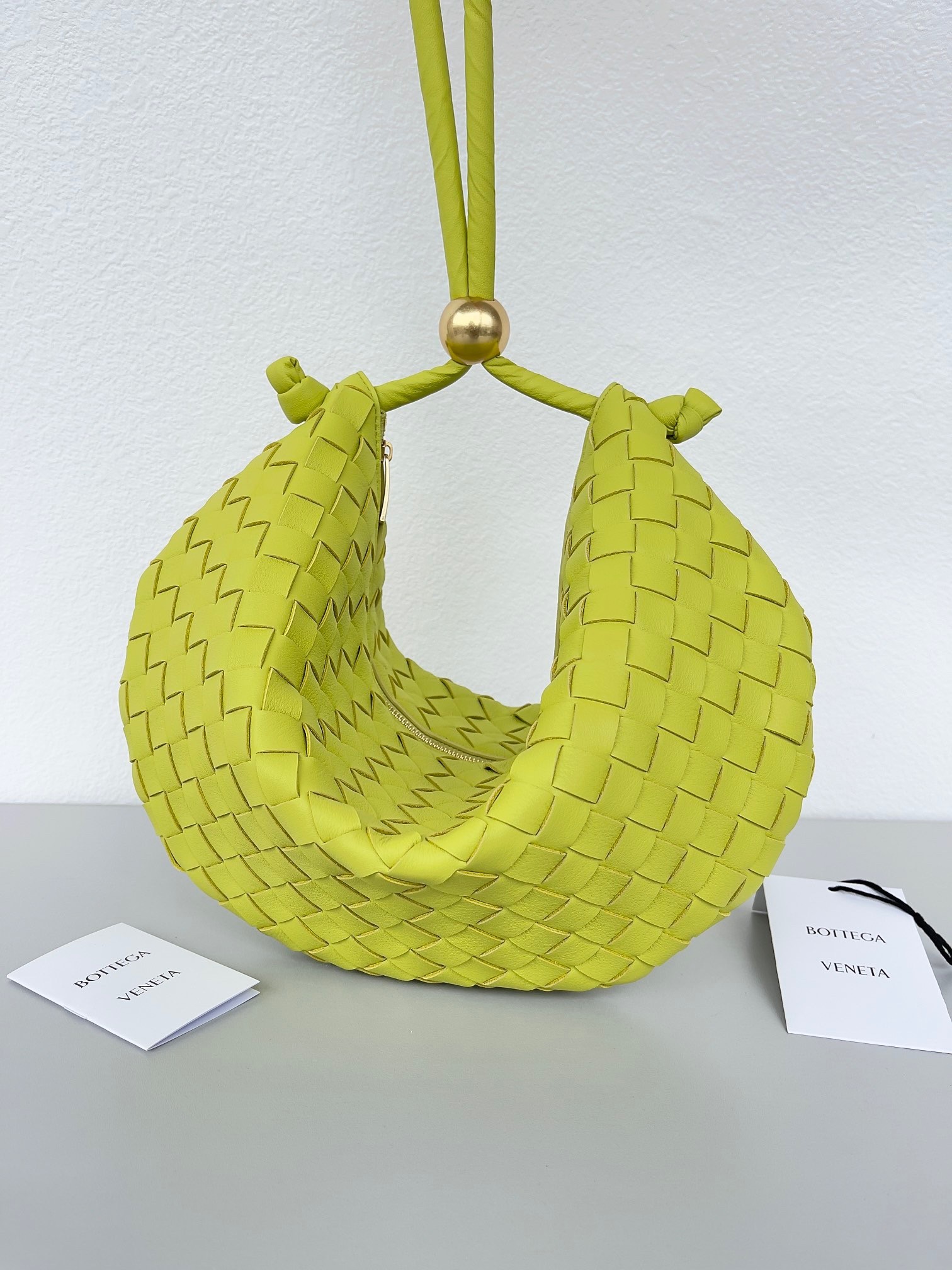 bo*te*ga Ve*ne*ta turn bag in acid kiwi intrecciato lambskin