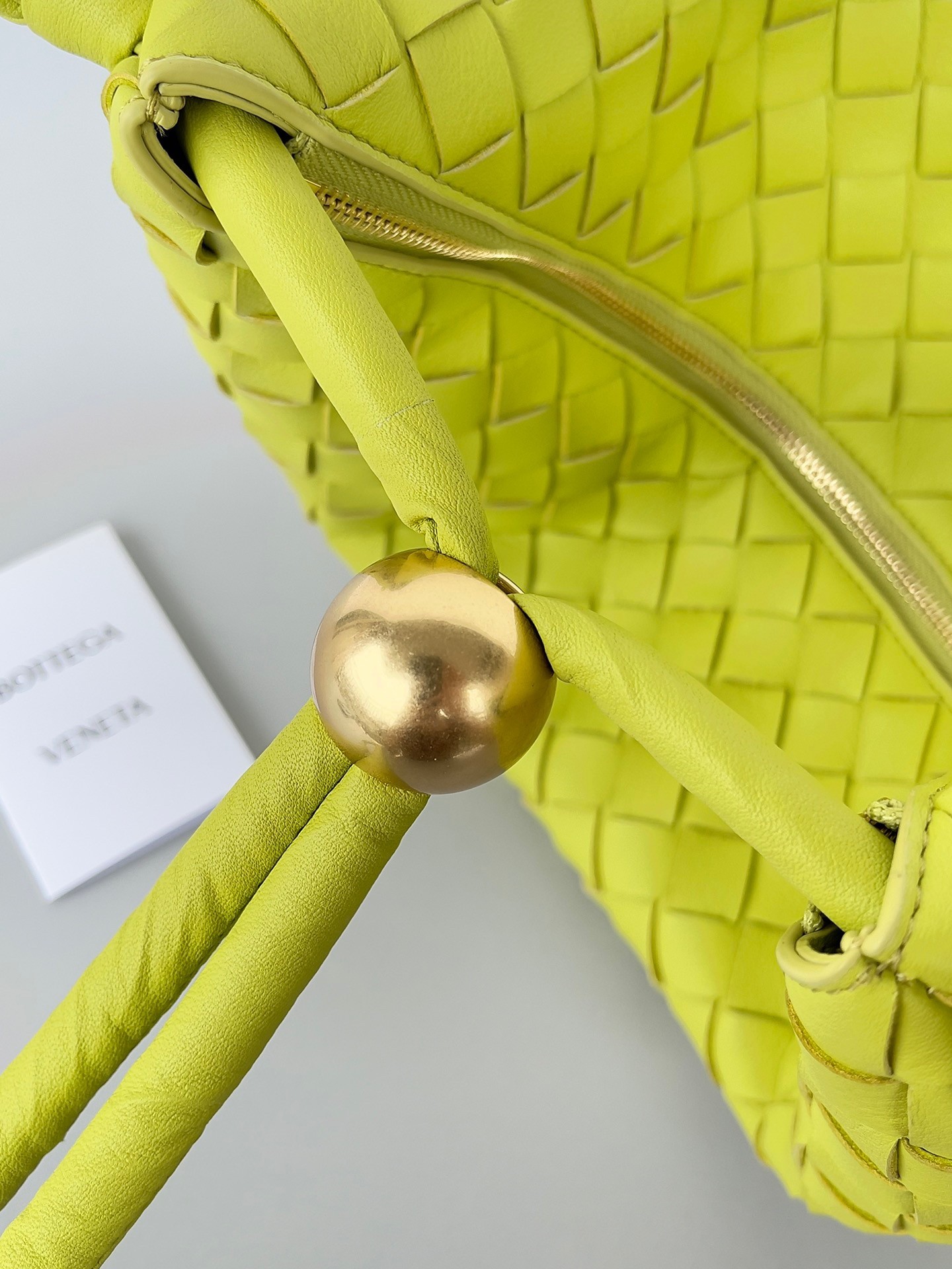 bo*te*ga Ve*ne*ta turn bag in acid kiwi intrecciato lambskin