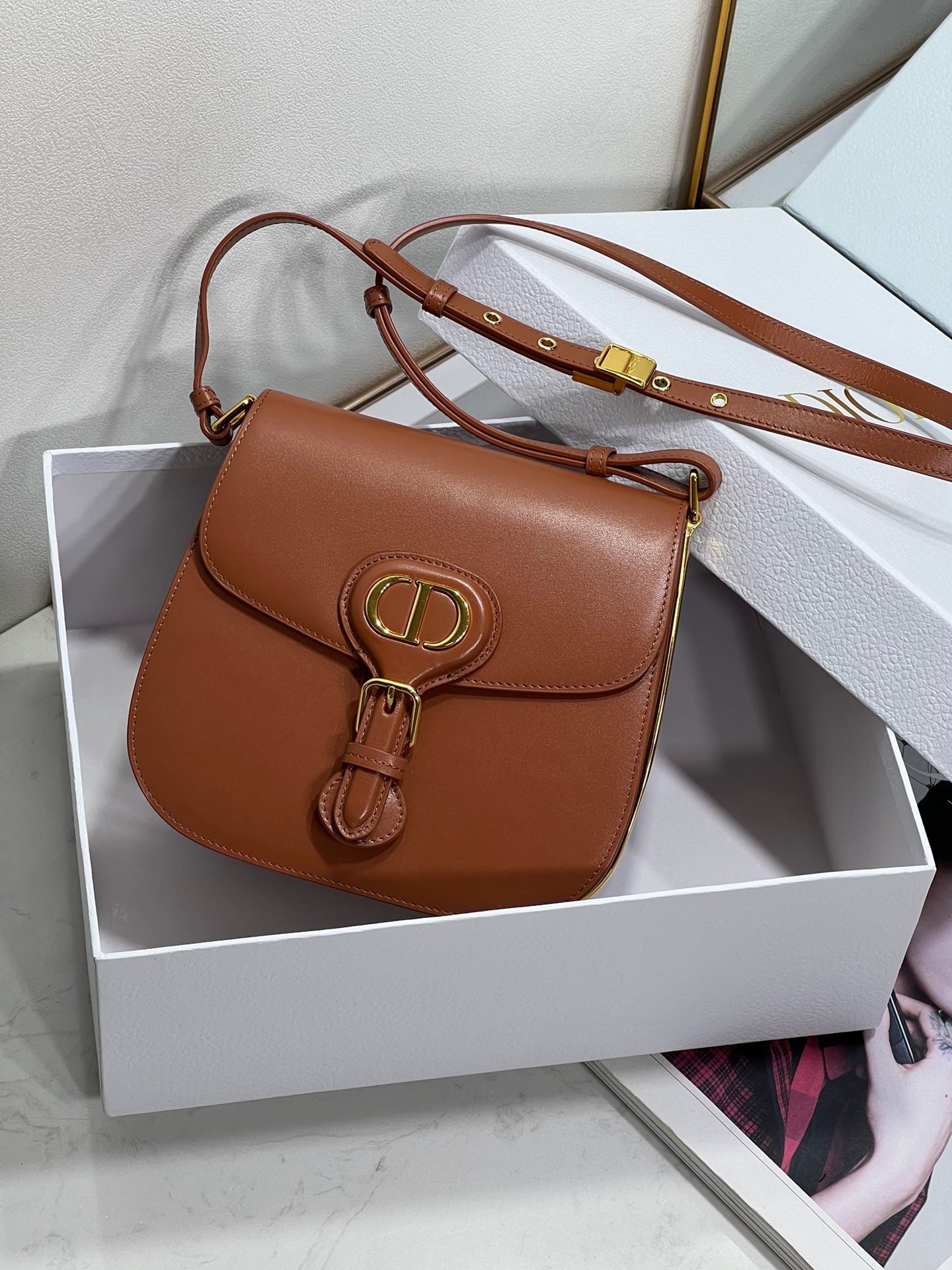 D*or bobby frame bag in brown box calfskin