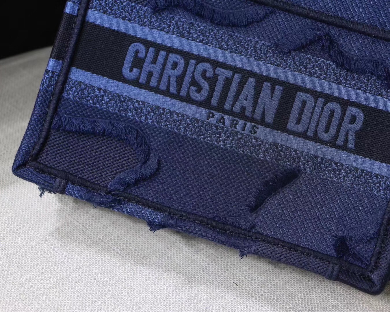 D*or mini book tote bag in blue camouflage canvas