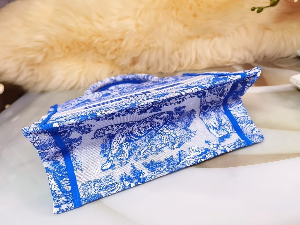 D*or small book tote bag in blue transparent toile de jouy canvas