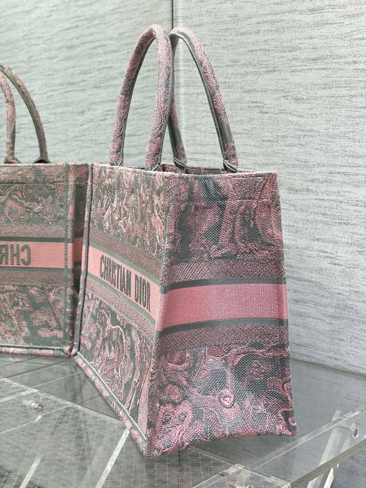 D*or medium book tote bag in grey and pink toile de jouy reverse embroidery
