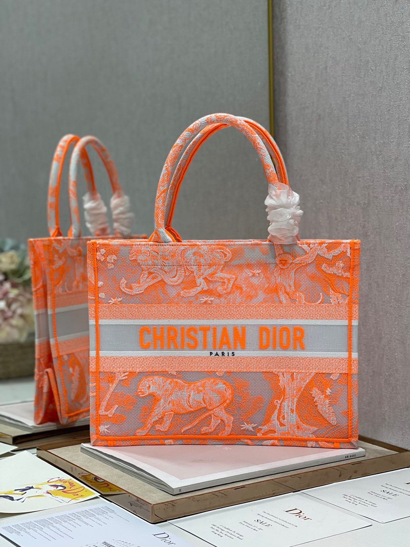 D*or medium book tote bag in orange transparent toile de jouy canvas