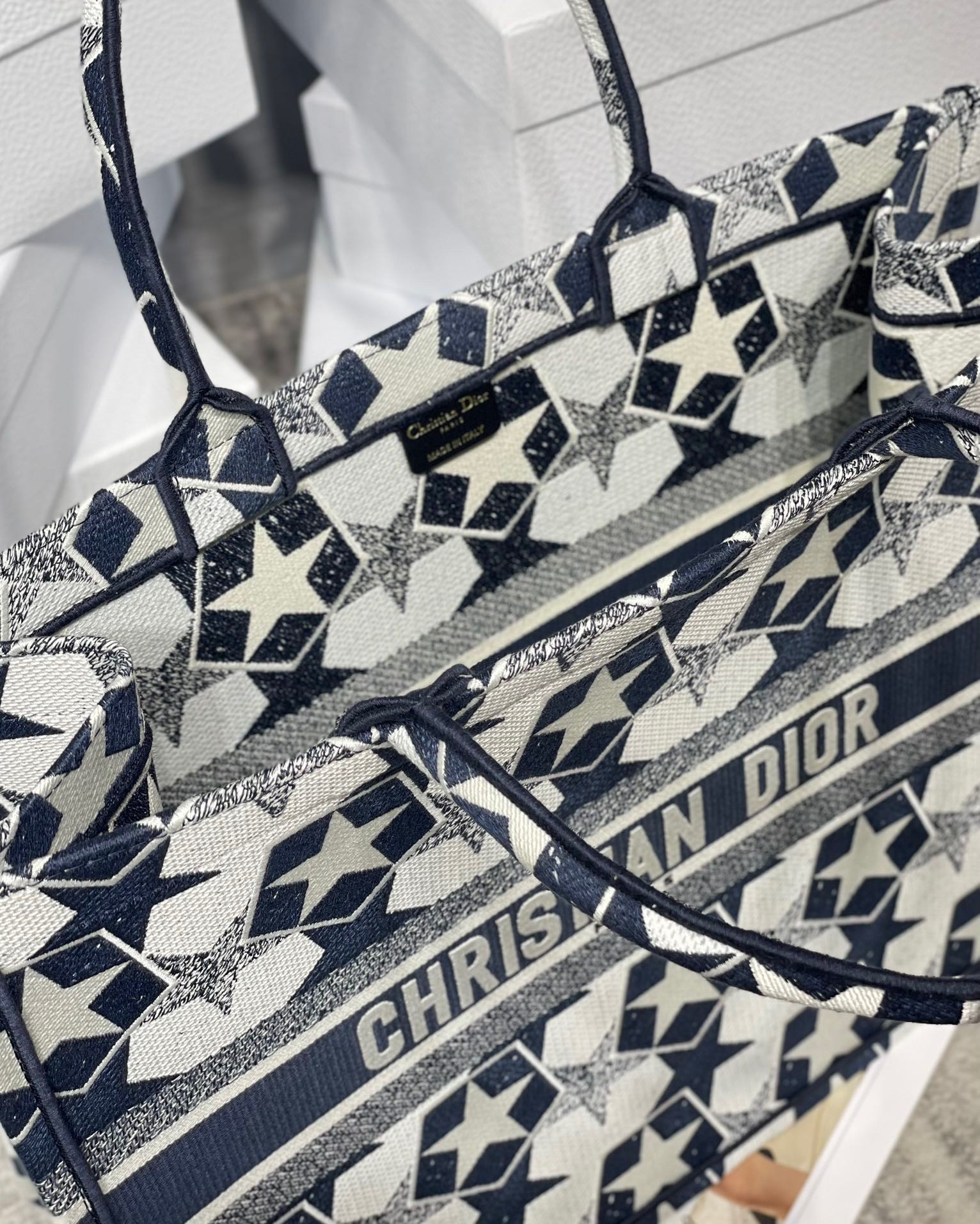 D*or large book tote bag in blue and white D*or etoile embroidery