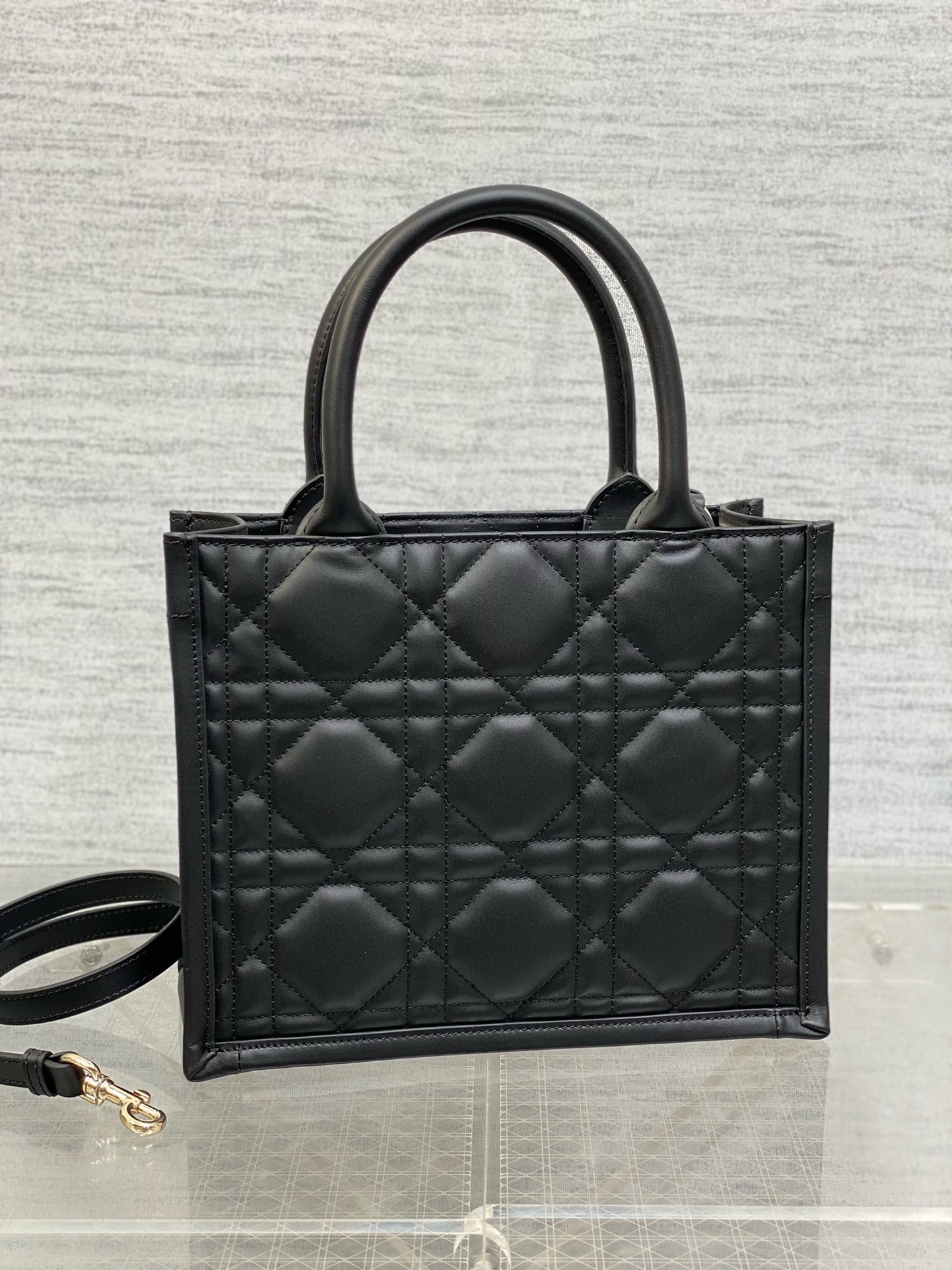 D*or small book tote bag with strap in black macrocannage calfskin