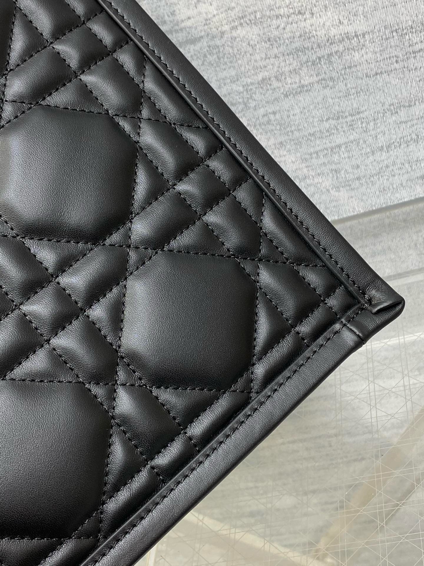 D*or small book tote bag with strap in black macrocannage calfskin