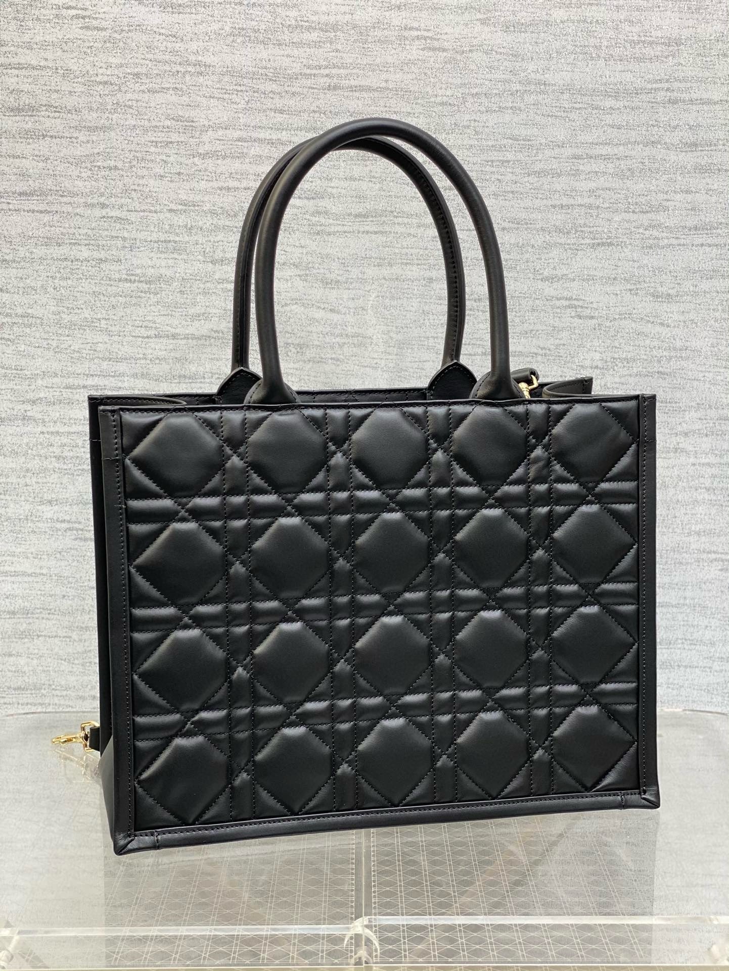 D*or medium book tote bag with strap in black macrocannage calfskin