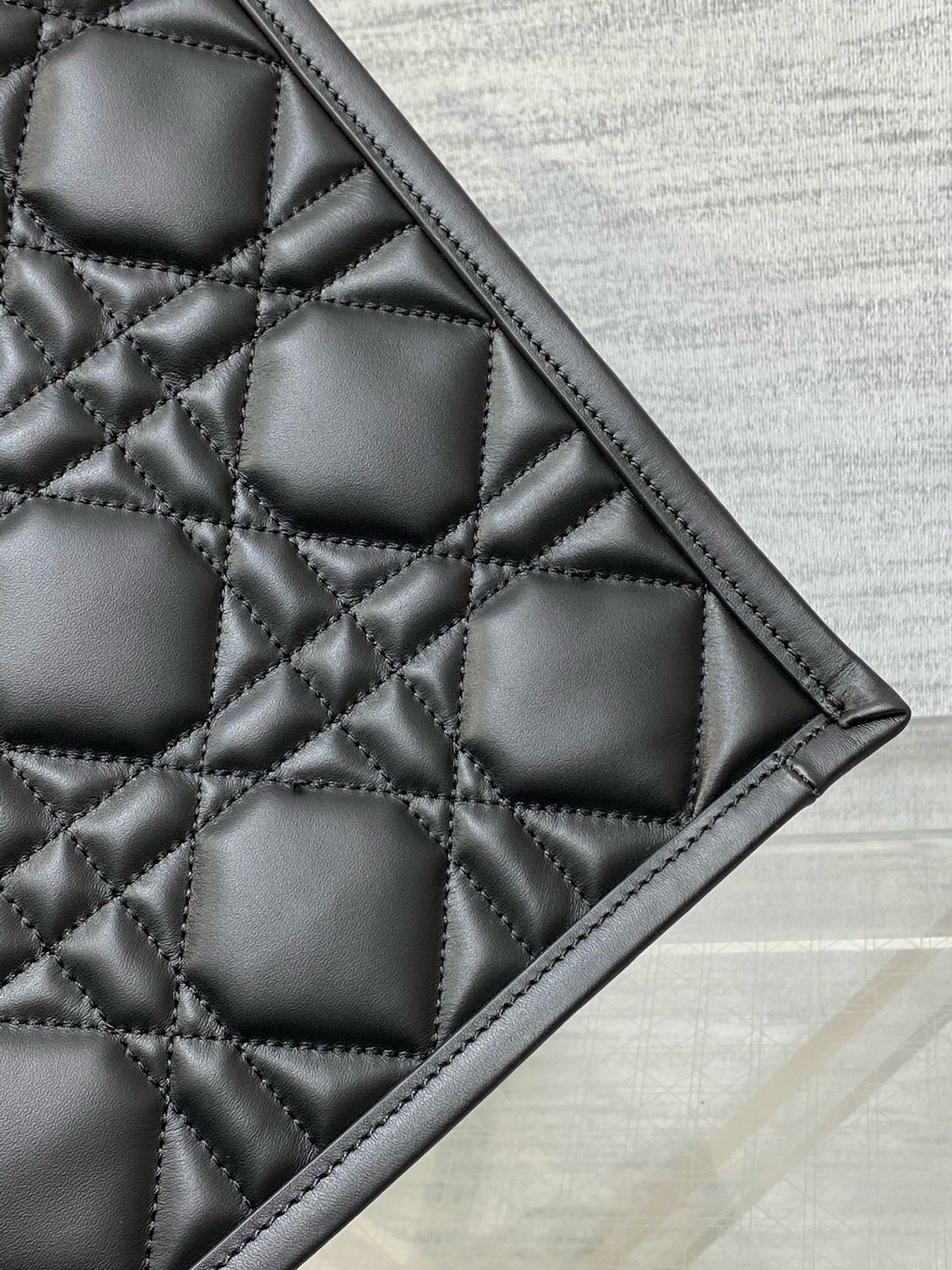 D*or medium book tote bag with strap in black macrocannage calfskin