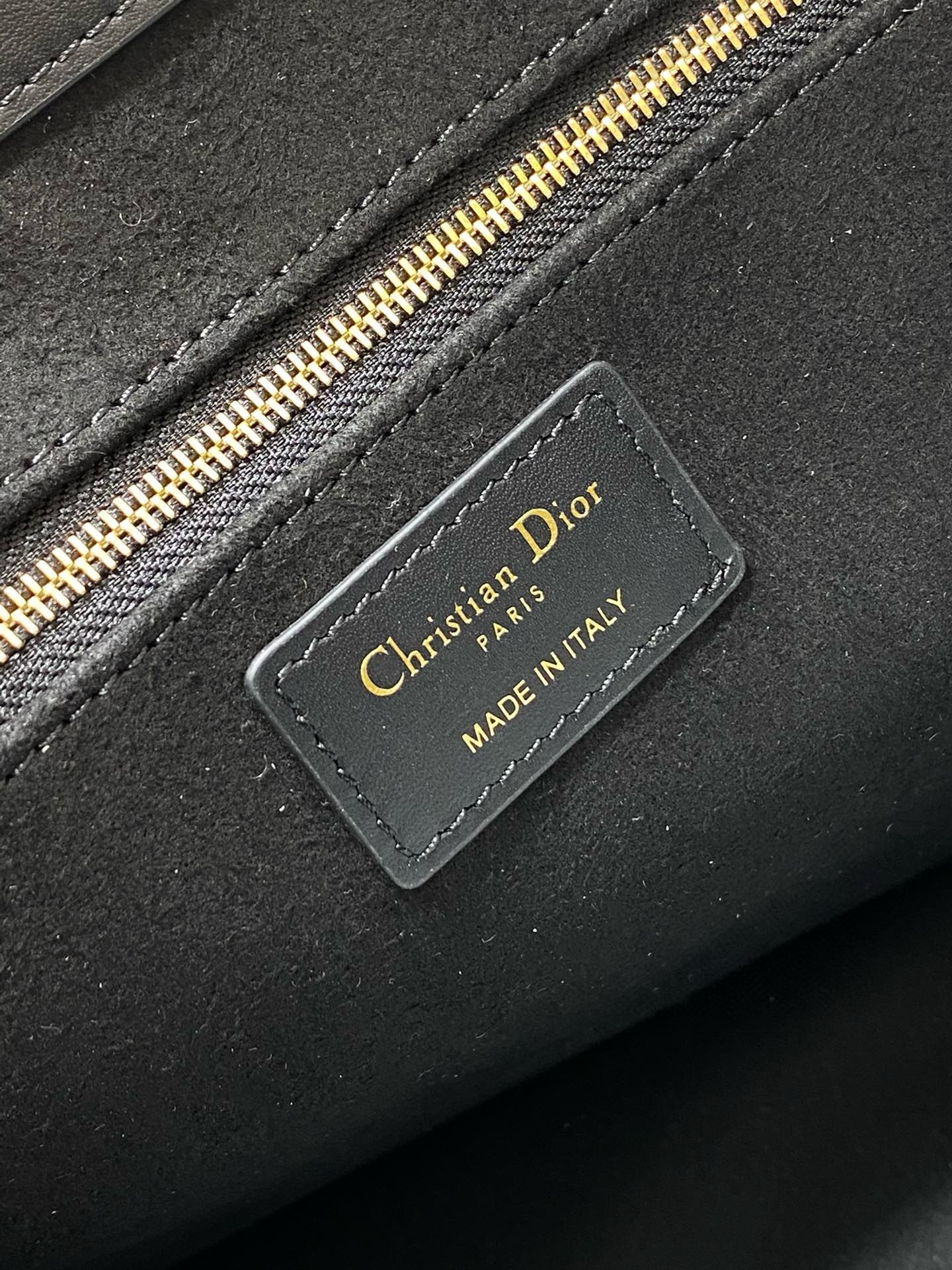 D*or medium book tote bag with strap in black macrocannage calfskin
