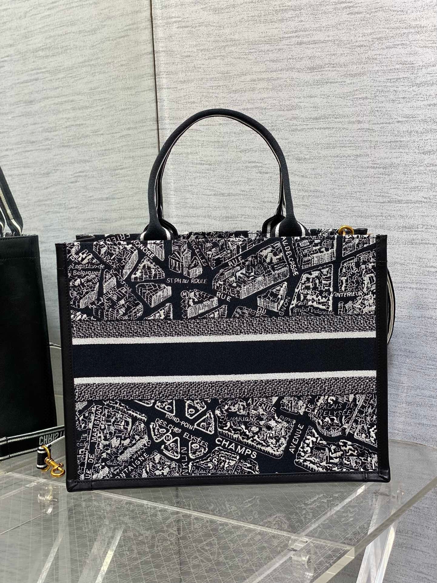 D*or medium book tote bag with strap in plan de paris embroidery and black calfskin