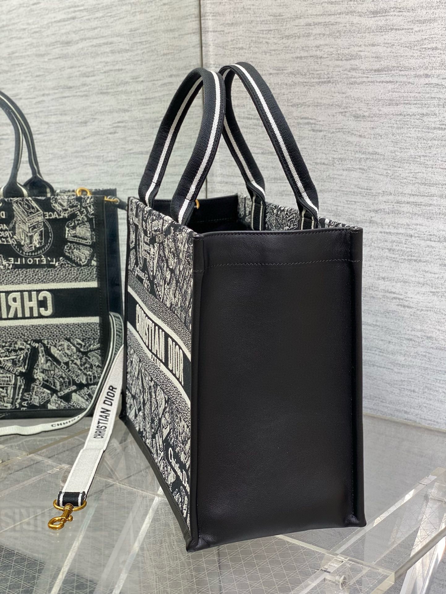 D*or medium book tote bag with strap in plan de paris embroidery and black calfskin